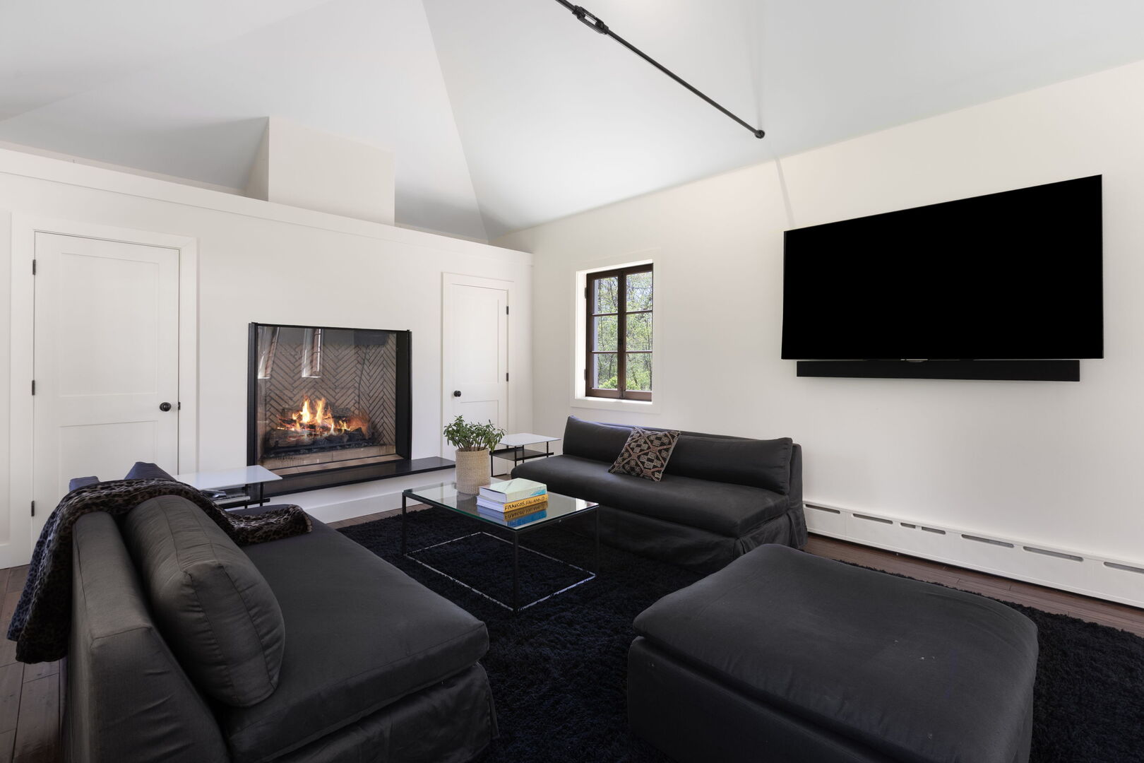 51 South Mayflower Road Lake Forest, IL 60045 - Photo 26 of 64 a living room with furniture and a flat screen tv