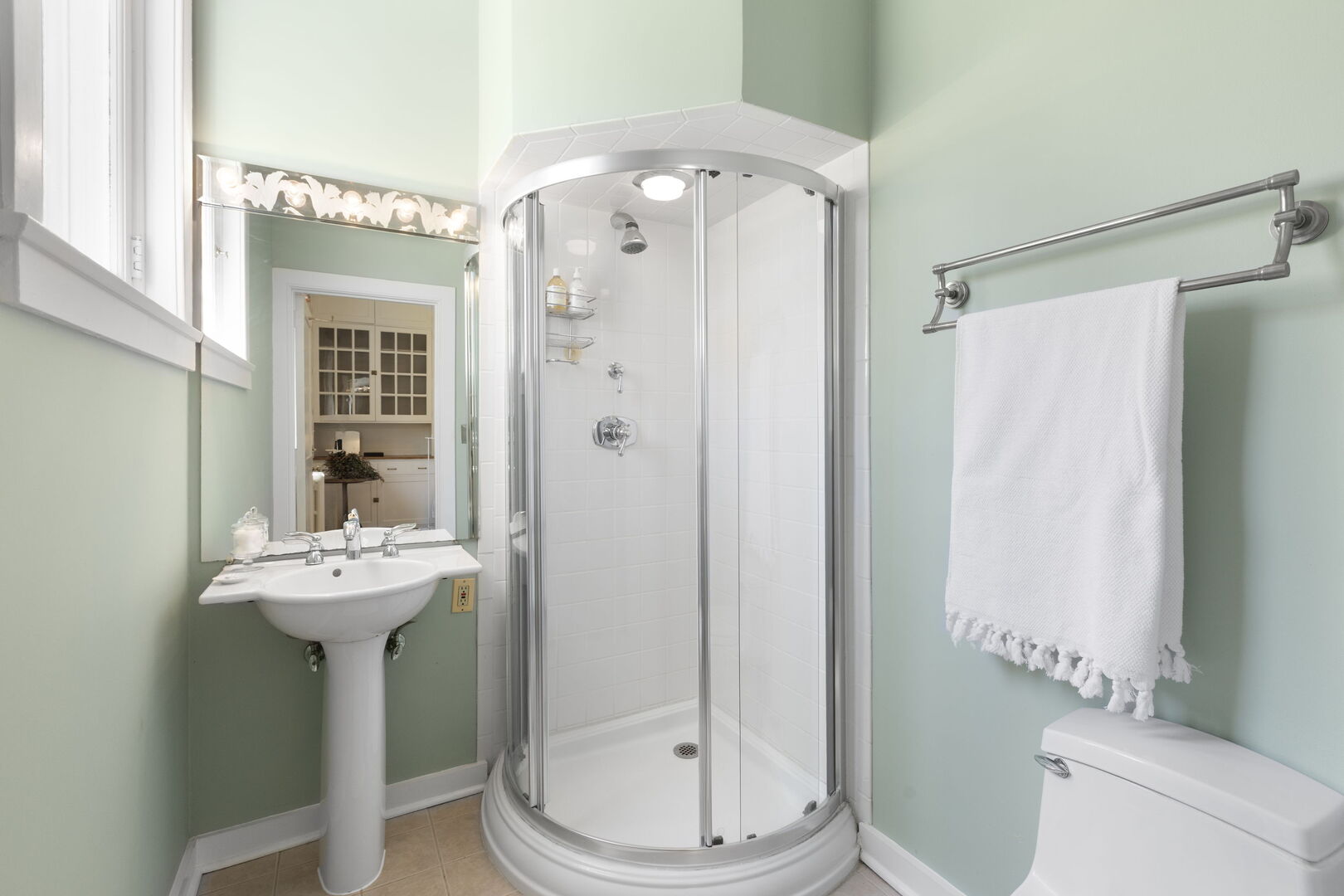 51 South Mayflower Road Lake Forest, IL 60045 - Photo 32 of 64 a bathroom with a sink mirror and toilet