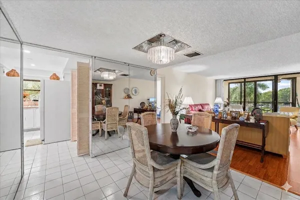 a kitchen with stainless steel appliances a stove a sink and a refrigerator