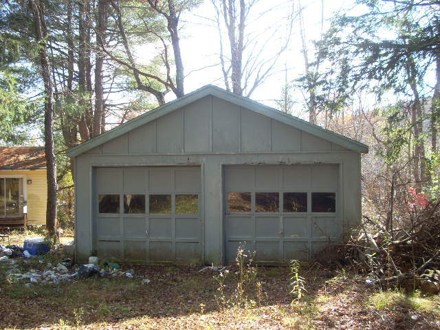269 Otis Road Becket, MA 01223 - Photo 2 of 3 a front view of a house