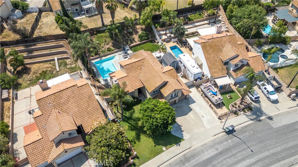 19465 Kinnow Lane Riverside, CA 92508 - Photo 53 of 61 an aerial view of a house with a yard and outdoor seating