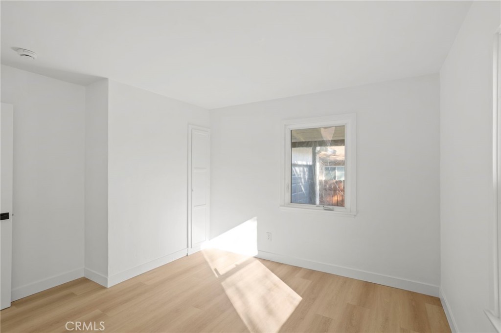 1290 Lomita Road San Bernardino, CA 92405 - Photo 14 of 29 a view of an empty room and window