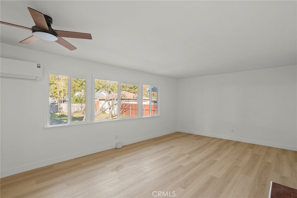 1290 Lomita Road San Bernardino, CA 92405 - Photo 7 of 29 a view of an empty room with a window