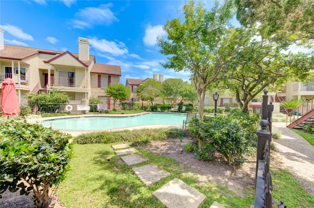 a view of house with yard