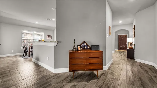 a room with furniture and wooden floor