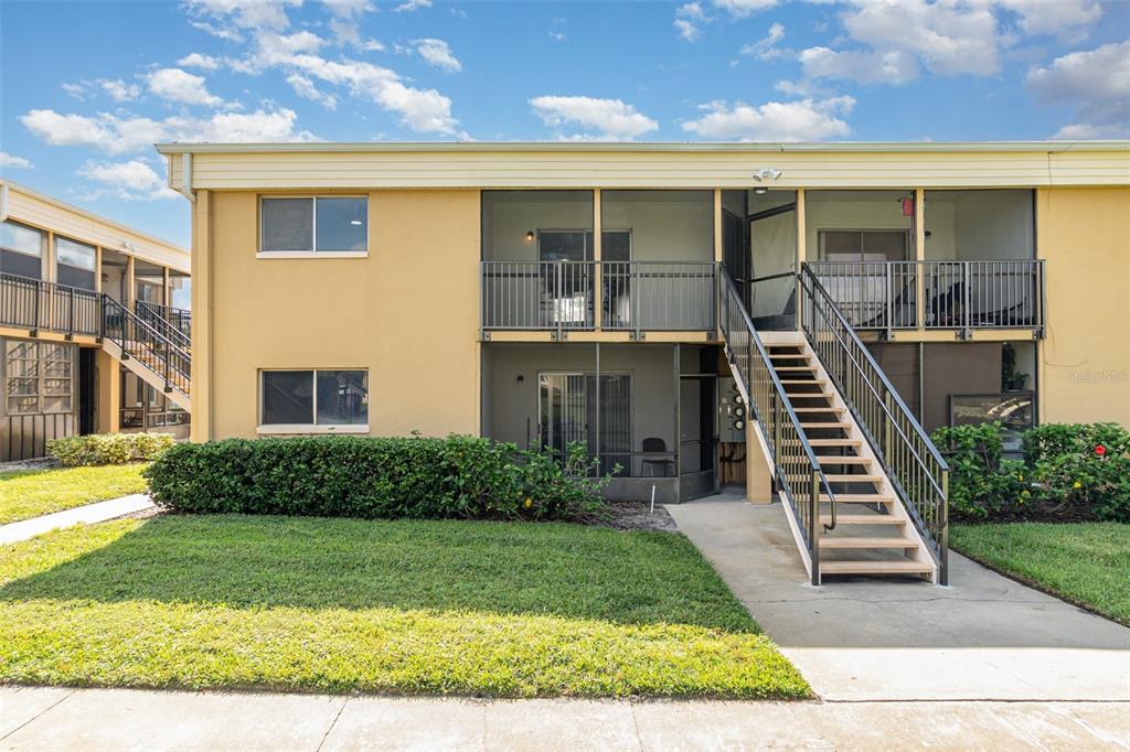 1000 Lake Of The Woods Boulevard, Unit E206 Fern Park, FL 32730 - Photo 17 of 17 a front view of a house with a yard
