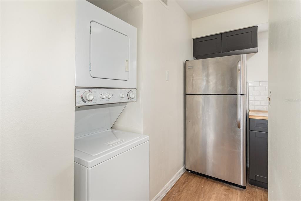 1000 Lake Of The Woods Boulevard, Unit E206 Fern Park, FL 32730 - Photo 5 of 17 a utility room with dryer and washer