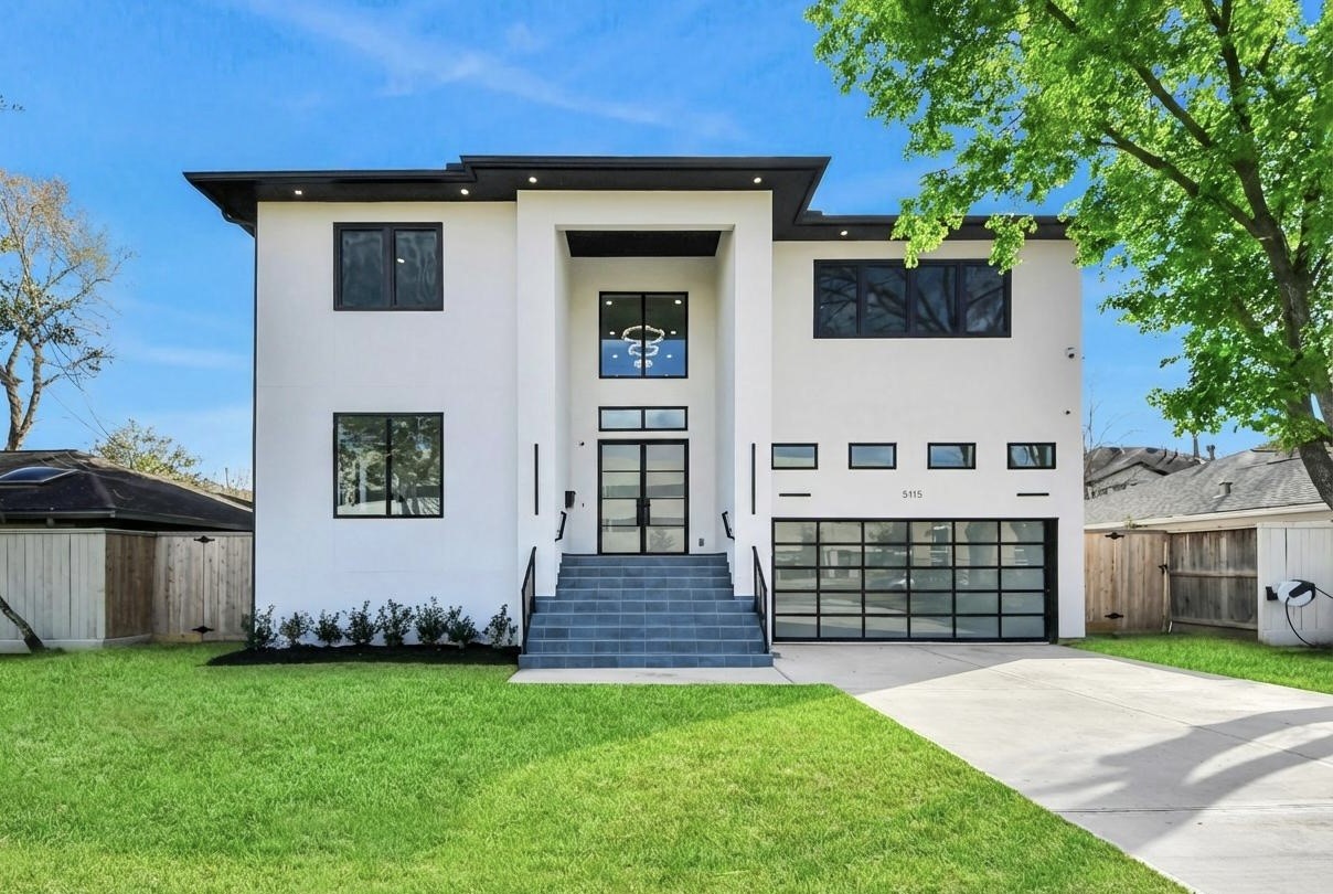 5115 Maple Street Bellaire, TX 77401 - Photo 3 of 45 Beautifully framed by mature trees and manicured landscaping, this stunning modern residence blends bold architecture with inviting curb appeal in a serene neighborhood setting.