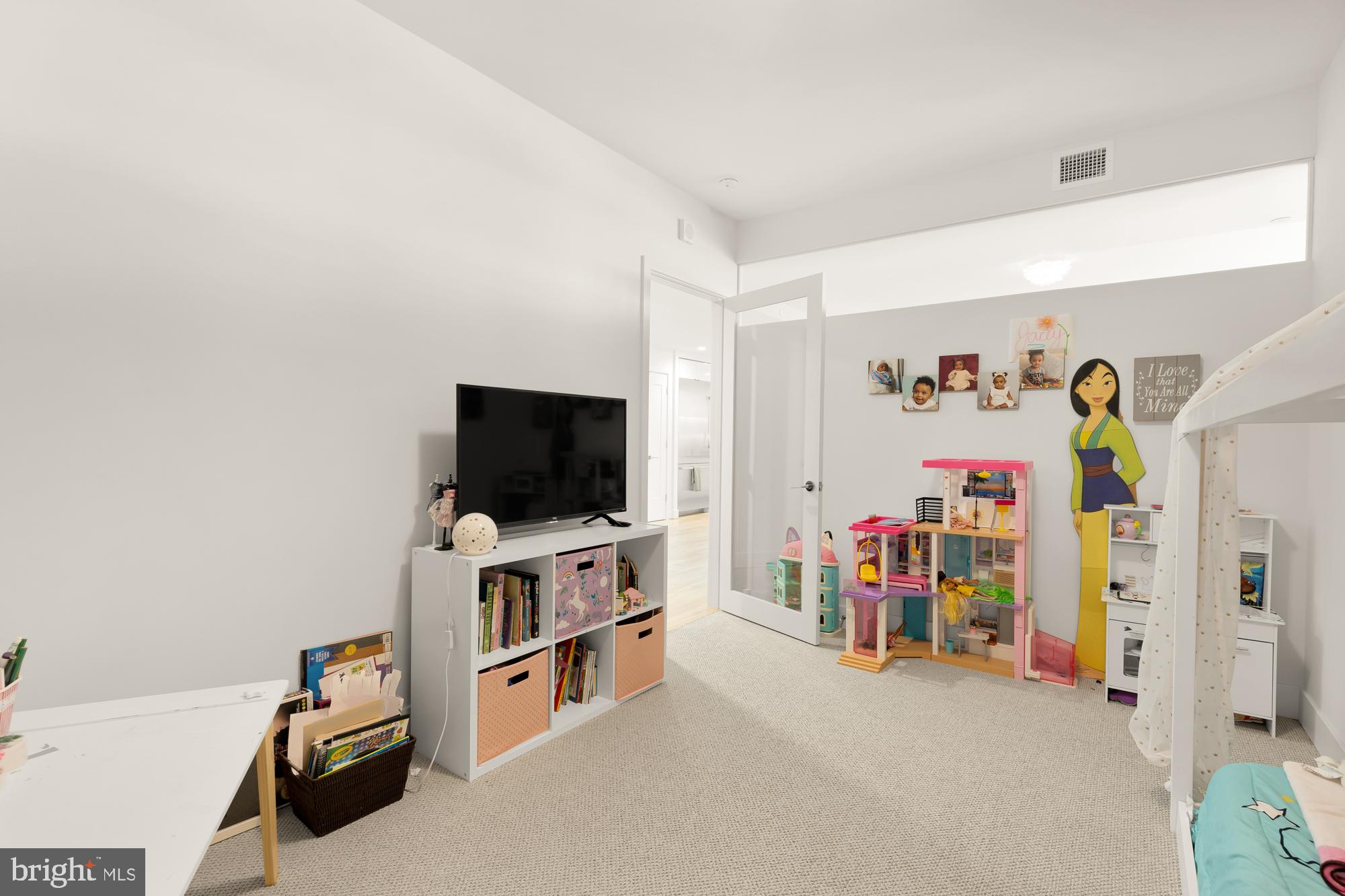 45 Sutton Square Southwest, Unit 706 Washington, DC 20024 - Photo 24 of 51 a living room with furniture and a flat screen tv