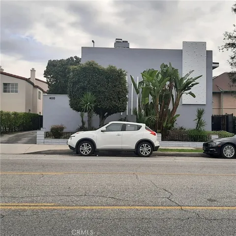 a car parked in front of a house
