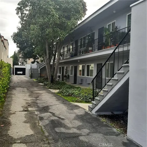 a house view with a garden space