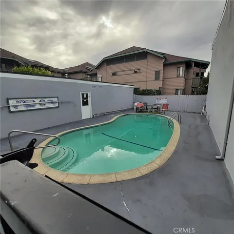 a view of a house with a swimming pool