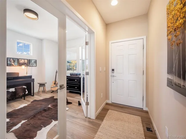 a view of a livingroom with furniture and a fireplace