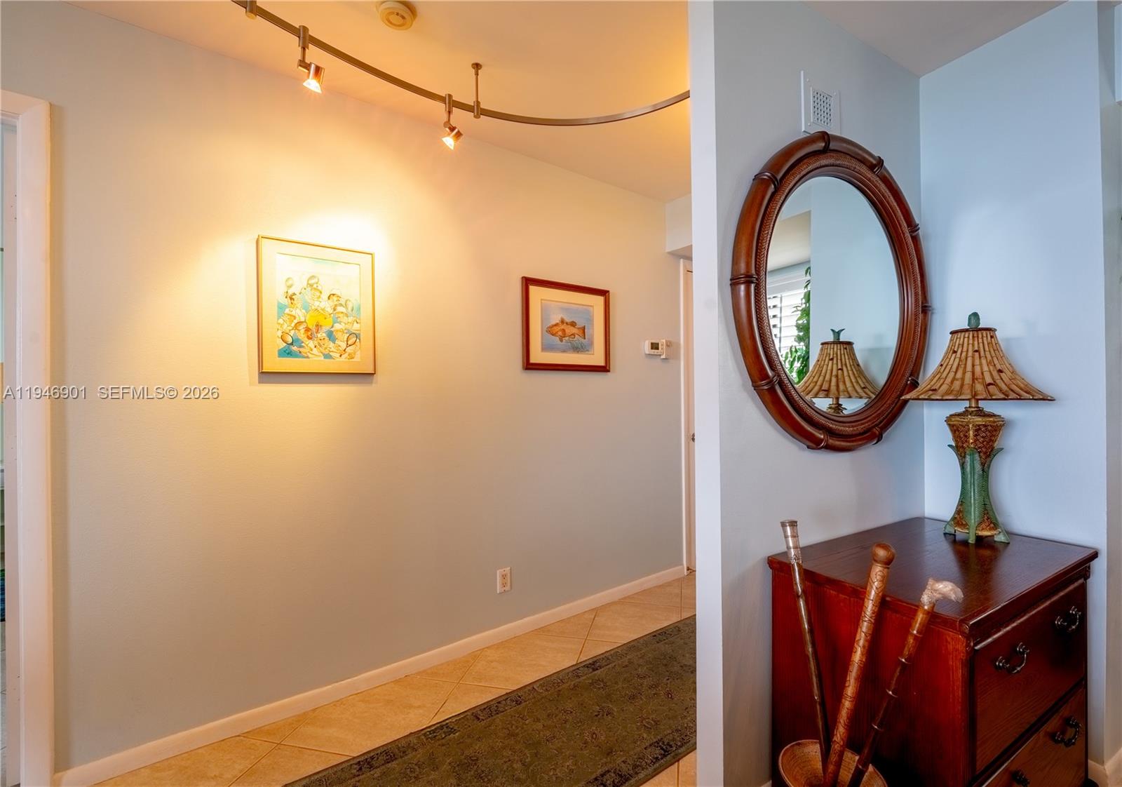 100 Ocean Trail Way, Unit 408 Jupiter, FL 33477 - Photo 24 of 46 a front view of a house with garden