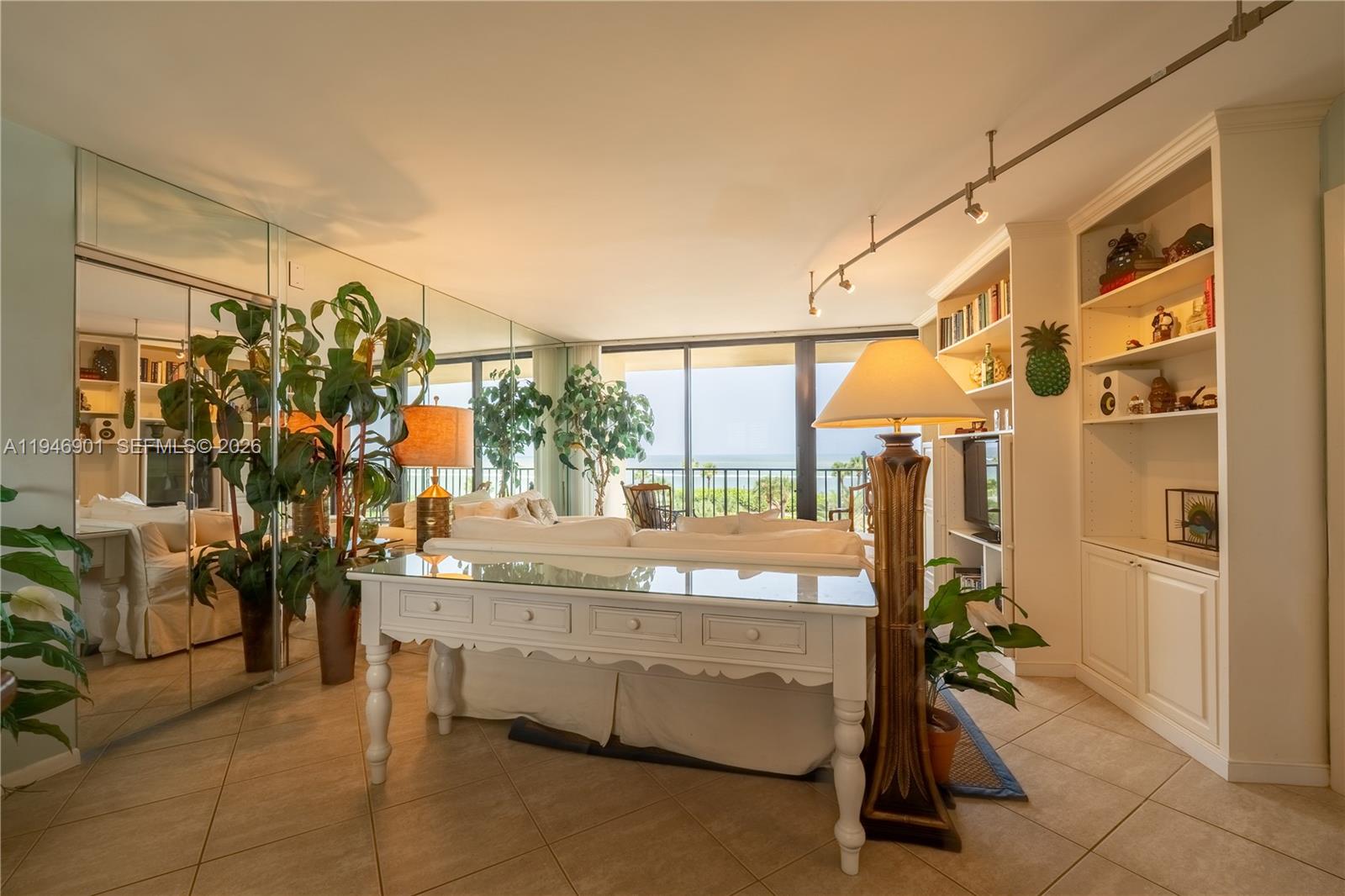 100 Ocean Trail Way, Unit 408 Jupiter, FL 33477 - Photo 35 of 46 a bedroom with furniture and a window