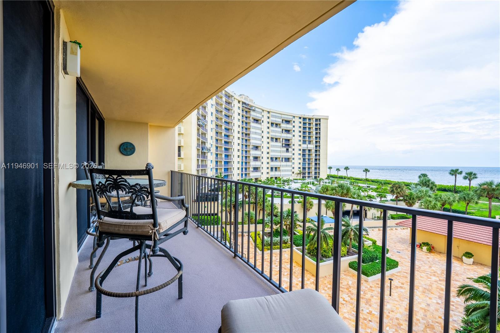 100 Ocean Trail Way, Unit 408 Jupiter, FL 33477 - Photo 44 of 46 a view of a balcony with chairs