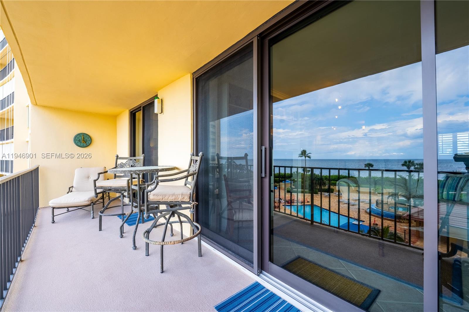 100 Ocean Trail Way, Unit 408 Jupiter, FL 33477 - Photo 45 of 46 a view of a balcony with furniture