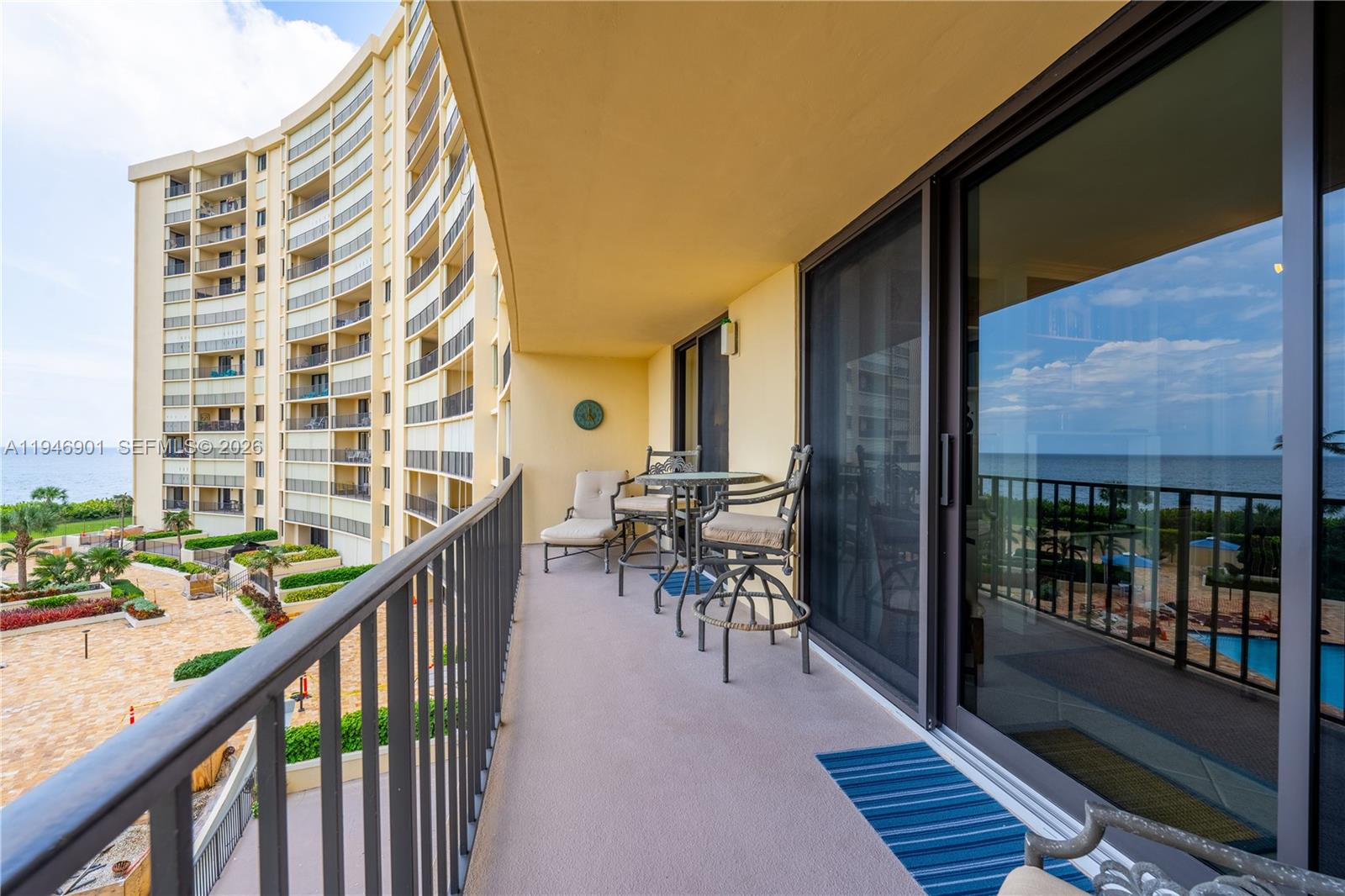 100 Ocean Trail Way, Unit 408 Jupiter, FL 33477 - Photo 46 of 46 a view of a balcony with chairs