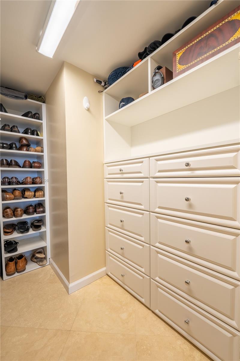 100 Ocean Trail Way, Unit 408 Jupiter, FL 33477 - Photo 7 of 46 a view of an empty walk in closet