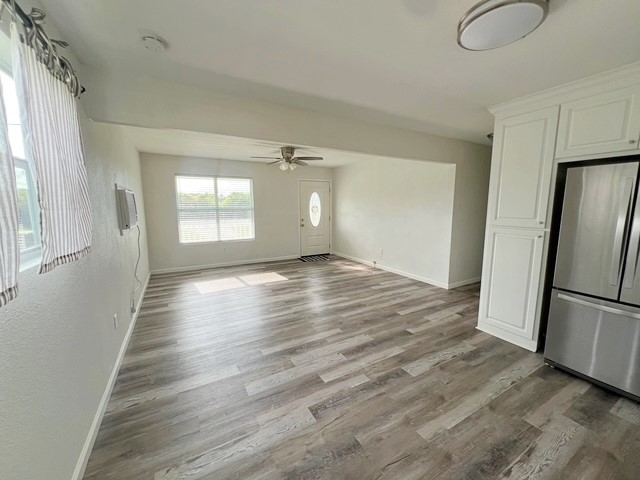 1855 Campbell Road Winnie, TX 77665 - Photo 6 of 11 a view of a room with wooden floor and window