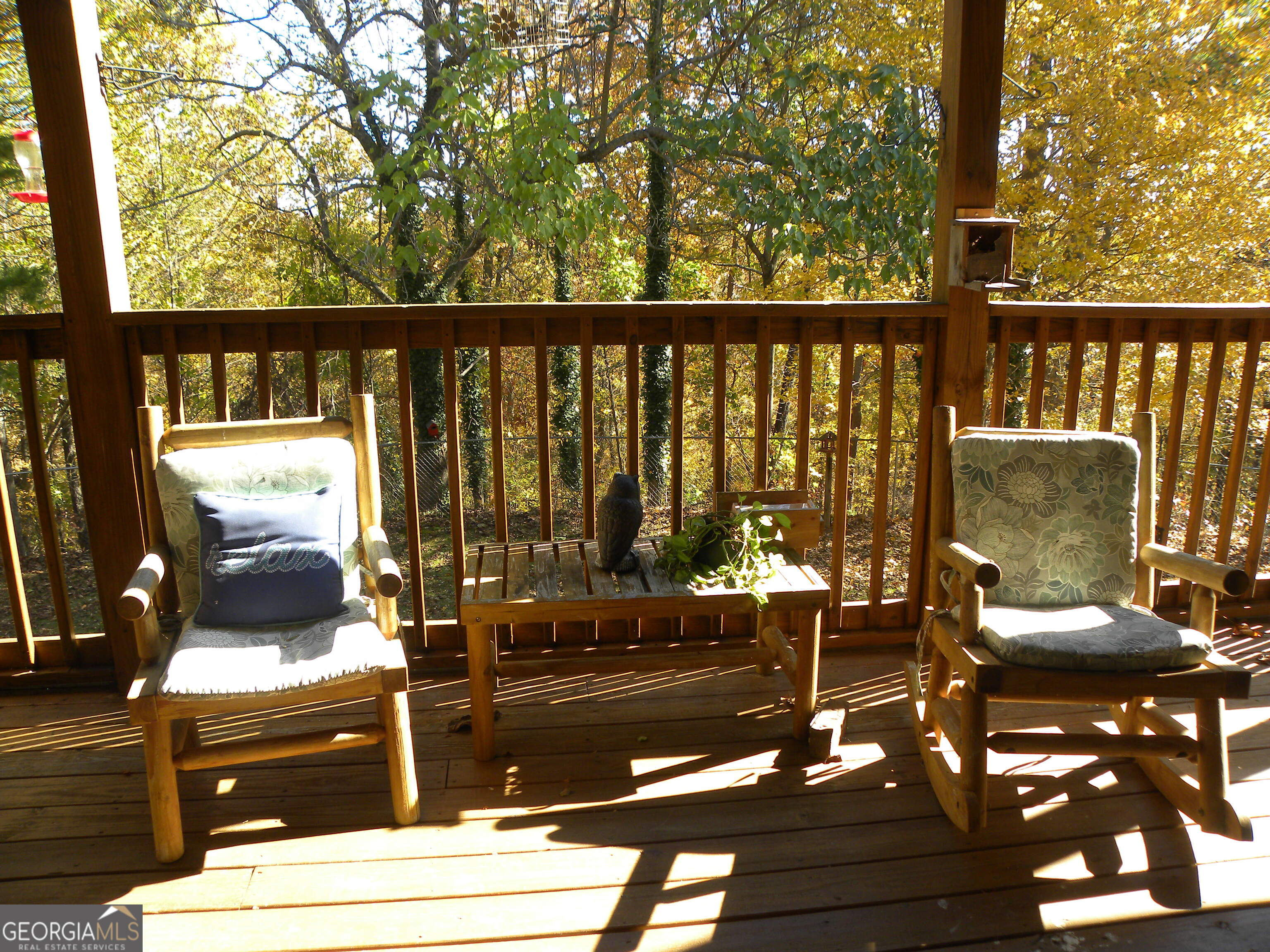 2484 Apple Pie Ridge Road, Unit 11 Alto, GA 30510 - Photo 33 of 95 a living room with large trees and plants