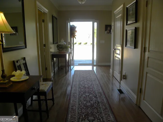 a spacious bedroom with a bed and a couch