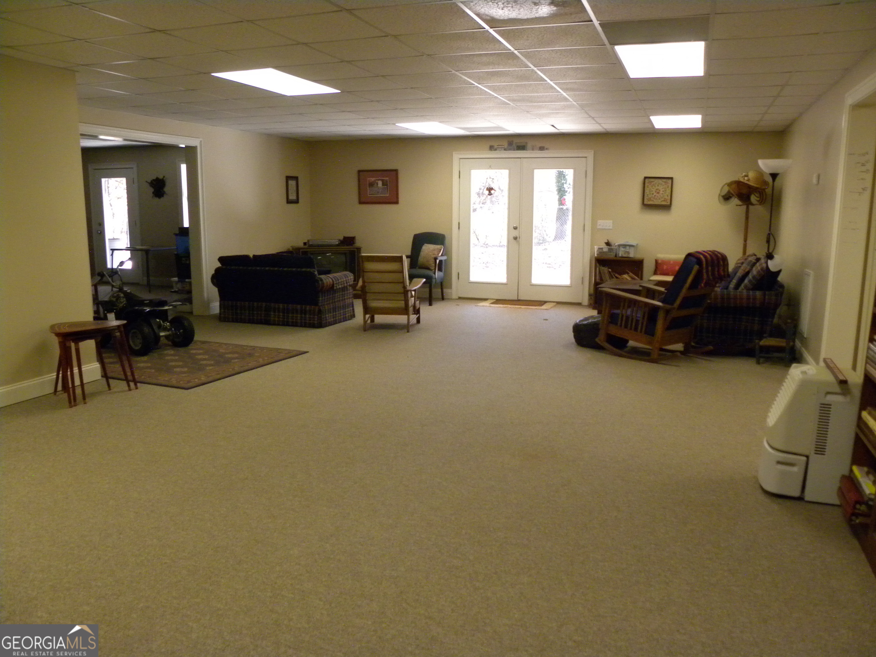2484 Apple Pie Ridge Road, Unit 11 Alto, GA 30510 - Photo 45 of 95 a living room with furniture and a large window
