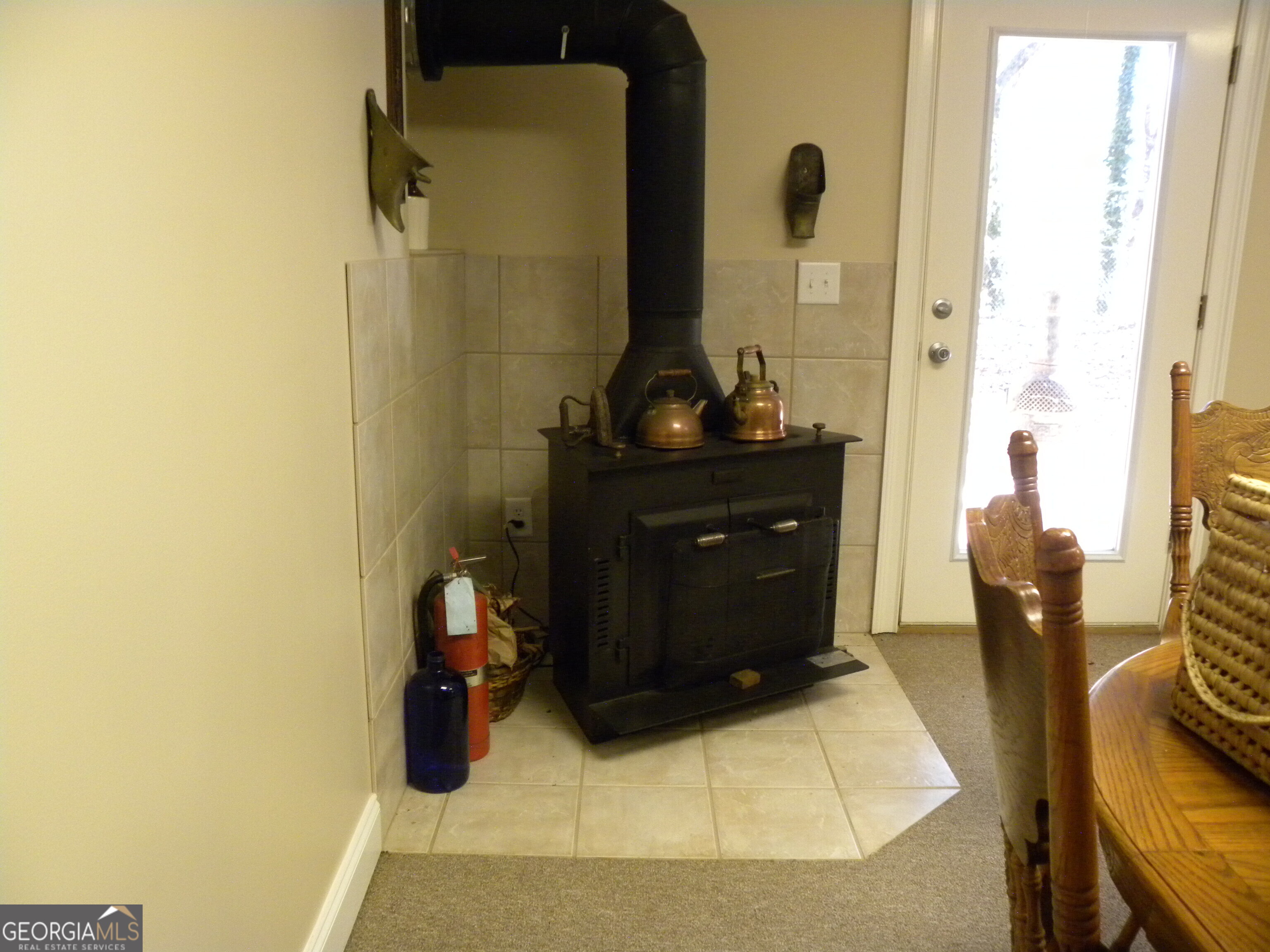 2484 Apple Pie Ridge Road, Unit 11 Alto, GA 30510 - Photo 54 of 95 a room with a table and a fireplace