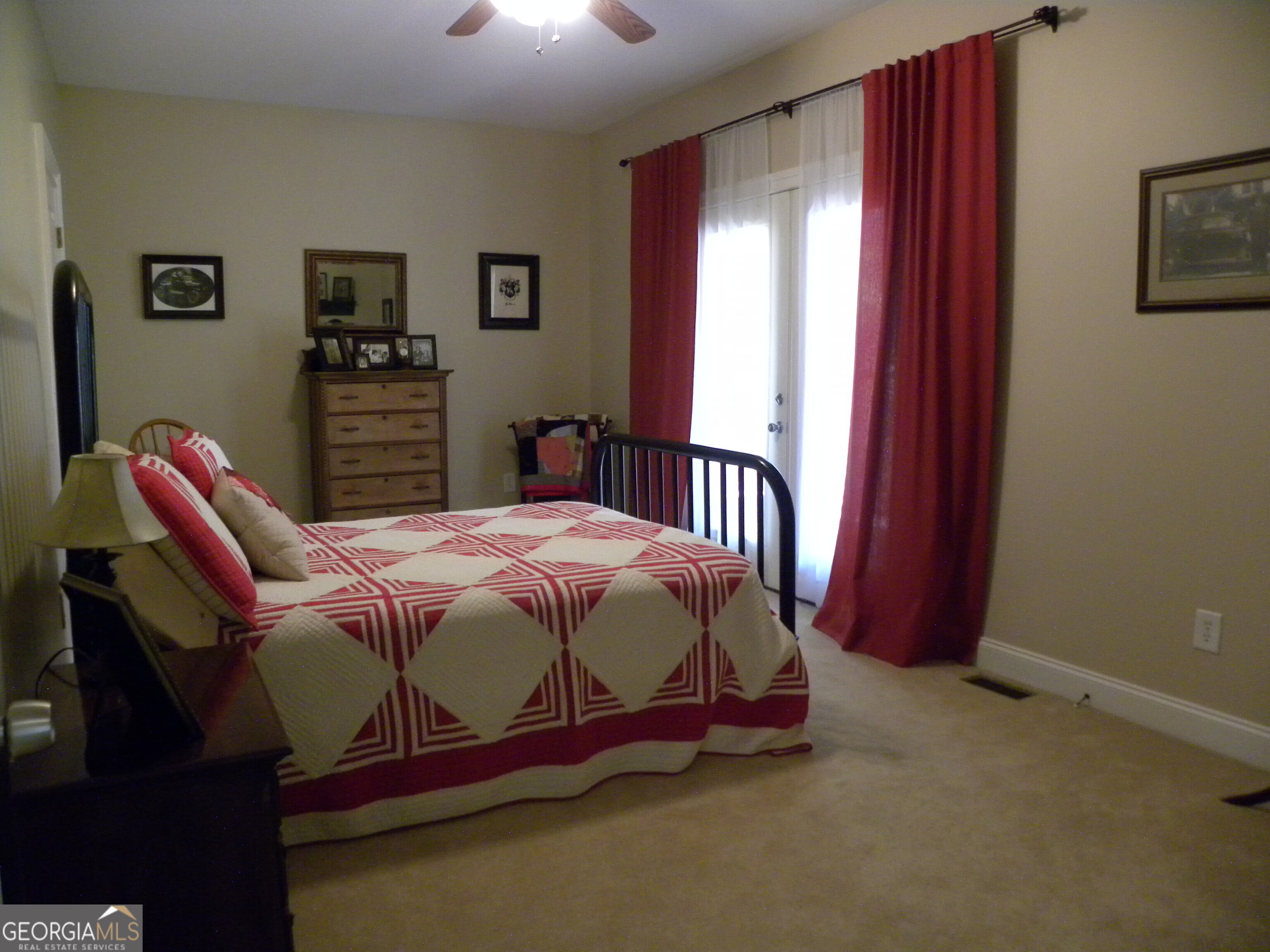 2484 Apple Pie Ridge Road, Unit 11 Alto, GA 30510 - Photo 64 of 95 a bed sitting in a bedroom next to a window