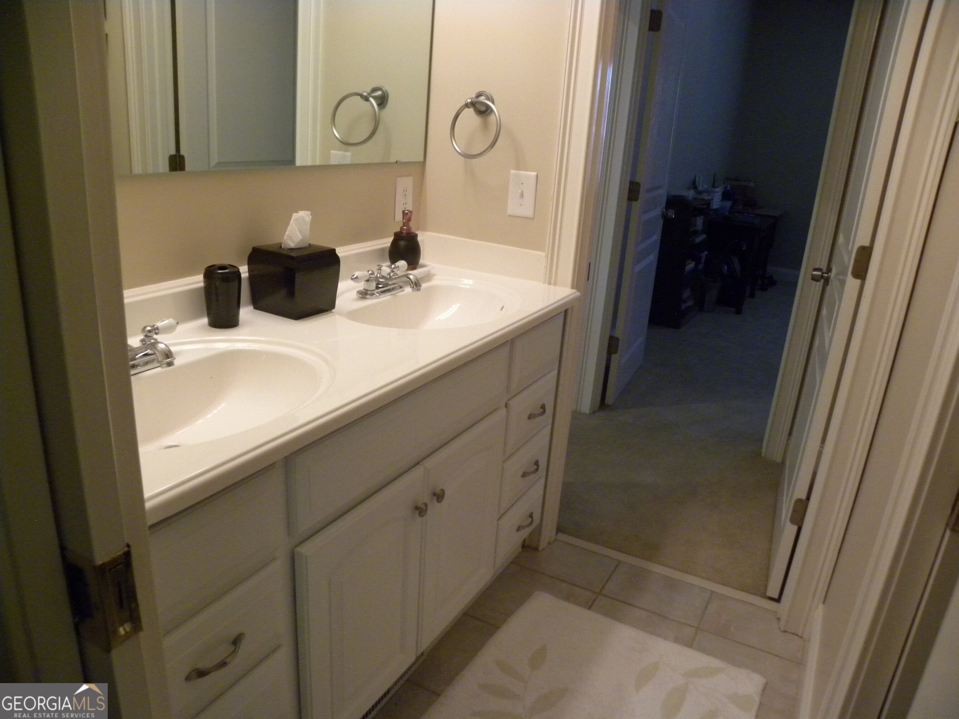 2484 Apple Pie Ridge Road, Unit 11 Alto, GA 30510 - Photo 65 of 95 a bathroom with a sink and a mirror
