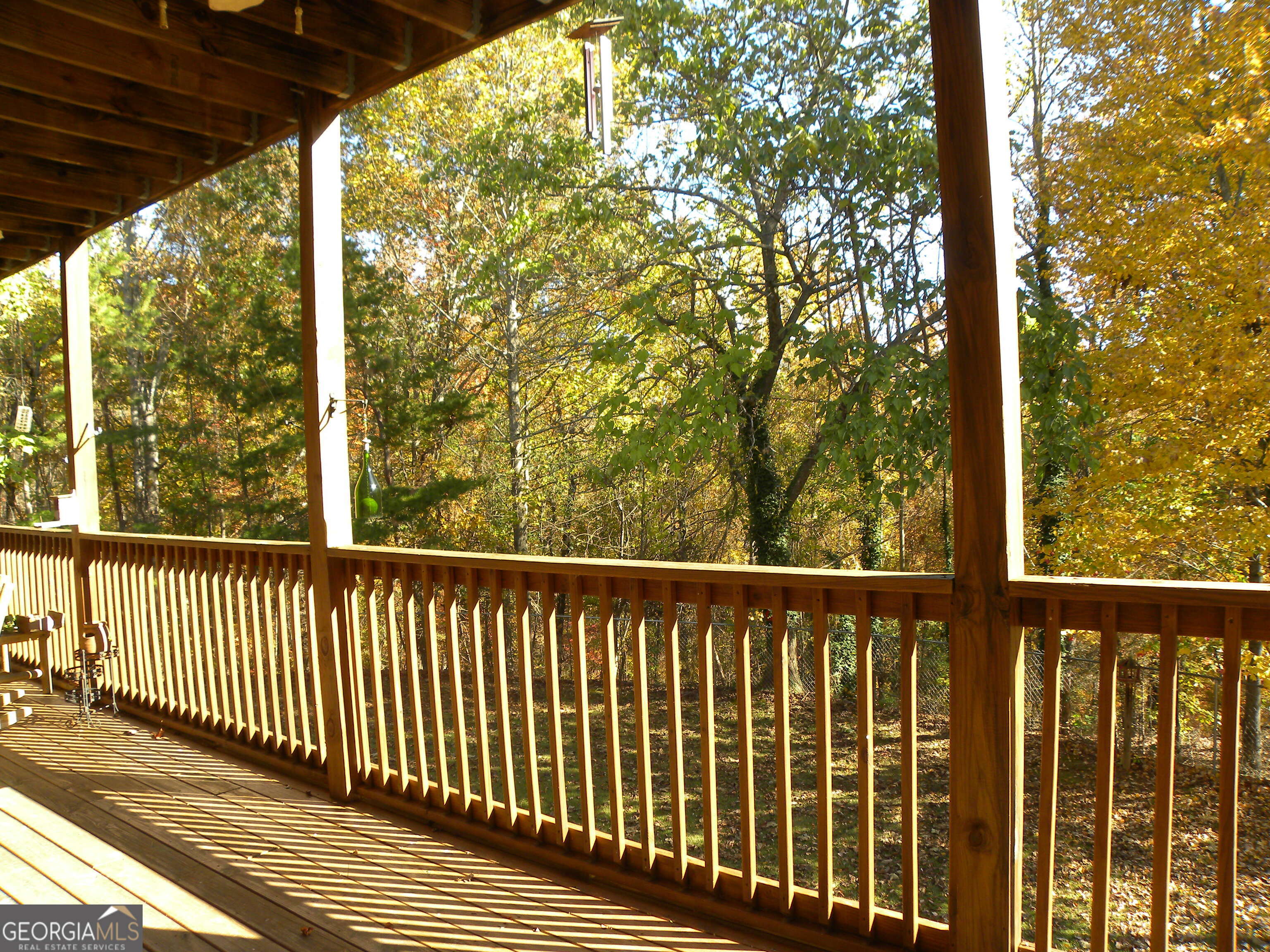 2484 Apple Pie Ridge Road, Unit 11 Alto, GA 30510 - Photo 7 of 95 a view of a wooden street from a balcony