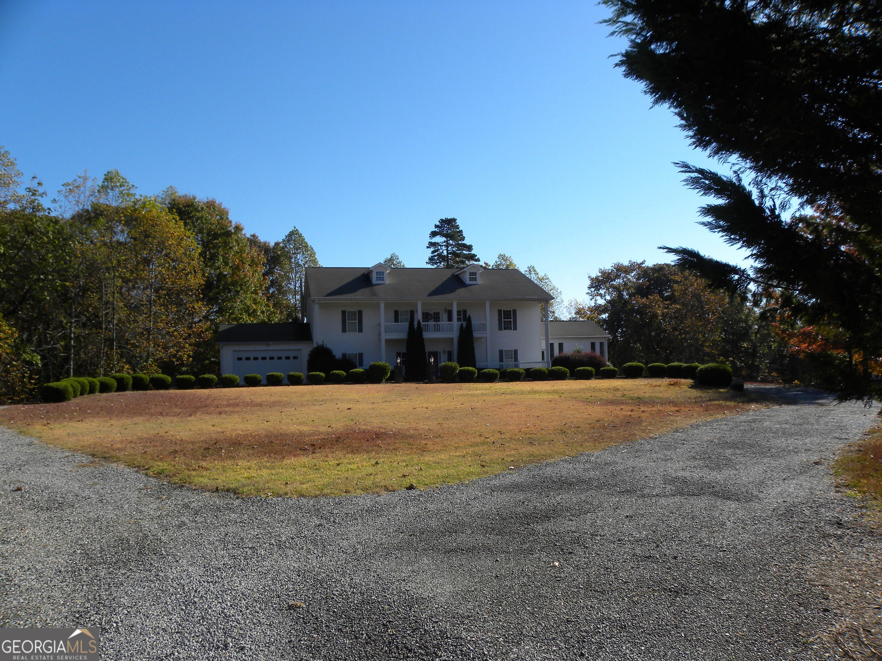 2484 Apple Pie Ridge Road, Unit 11 Alto, GA 30510 - Photo 72 of 95 a front view of a house with a yard and garage