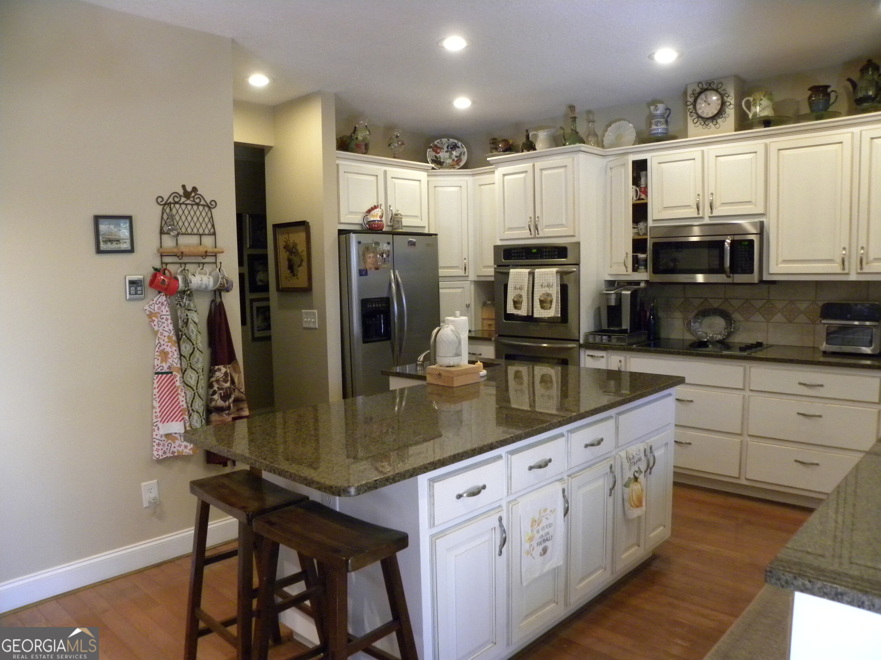 2484 Apple Pie Ridge Road, Unit 11 Alto, GA 30510 - Photo 10 of 95 a kitchen with stainless steel appliances granite countertop a refrigerator and a stove top oven