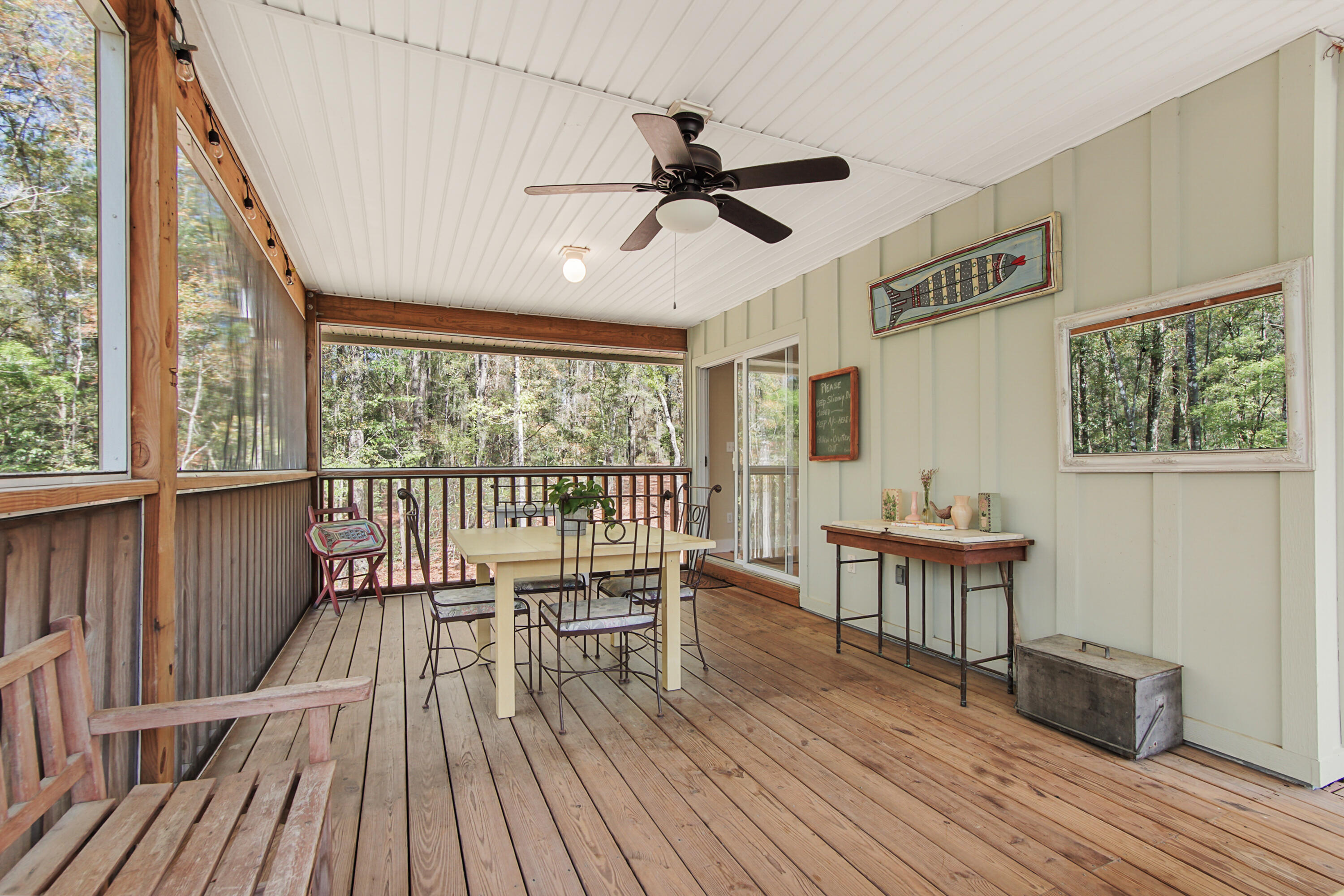 211 Lester Price Road Ponce de Leon, FL 32455 - Photo 12 of 63 a view of a room with wooden floor and balcony