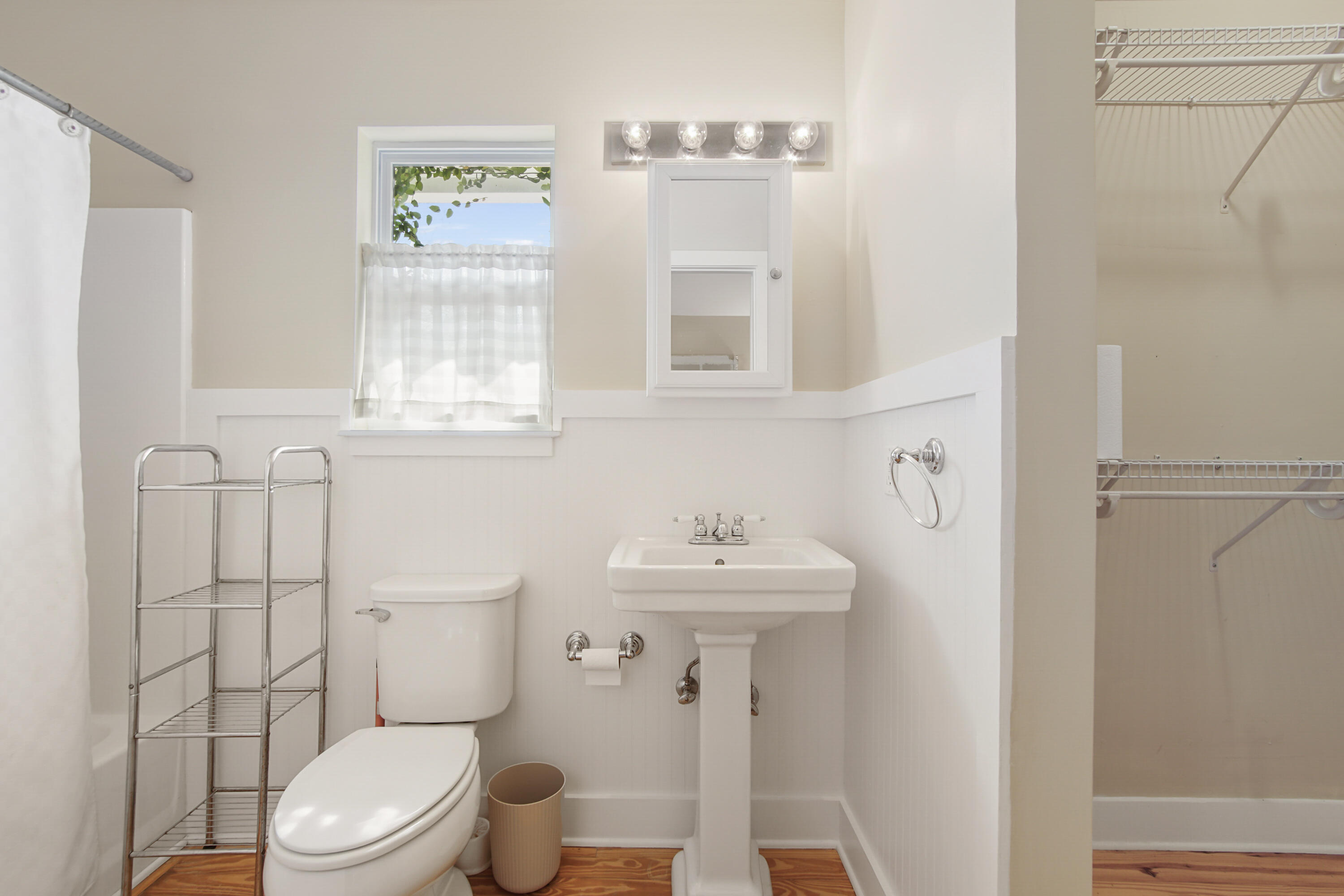211 Lester Price Road Ponce de Leon, FL 32455 - Photo 16 of 63 a bathroom with a sink mirror toilet and shower