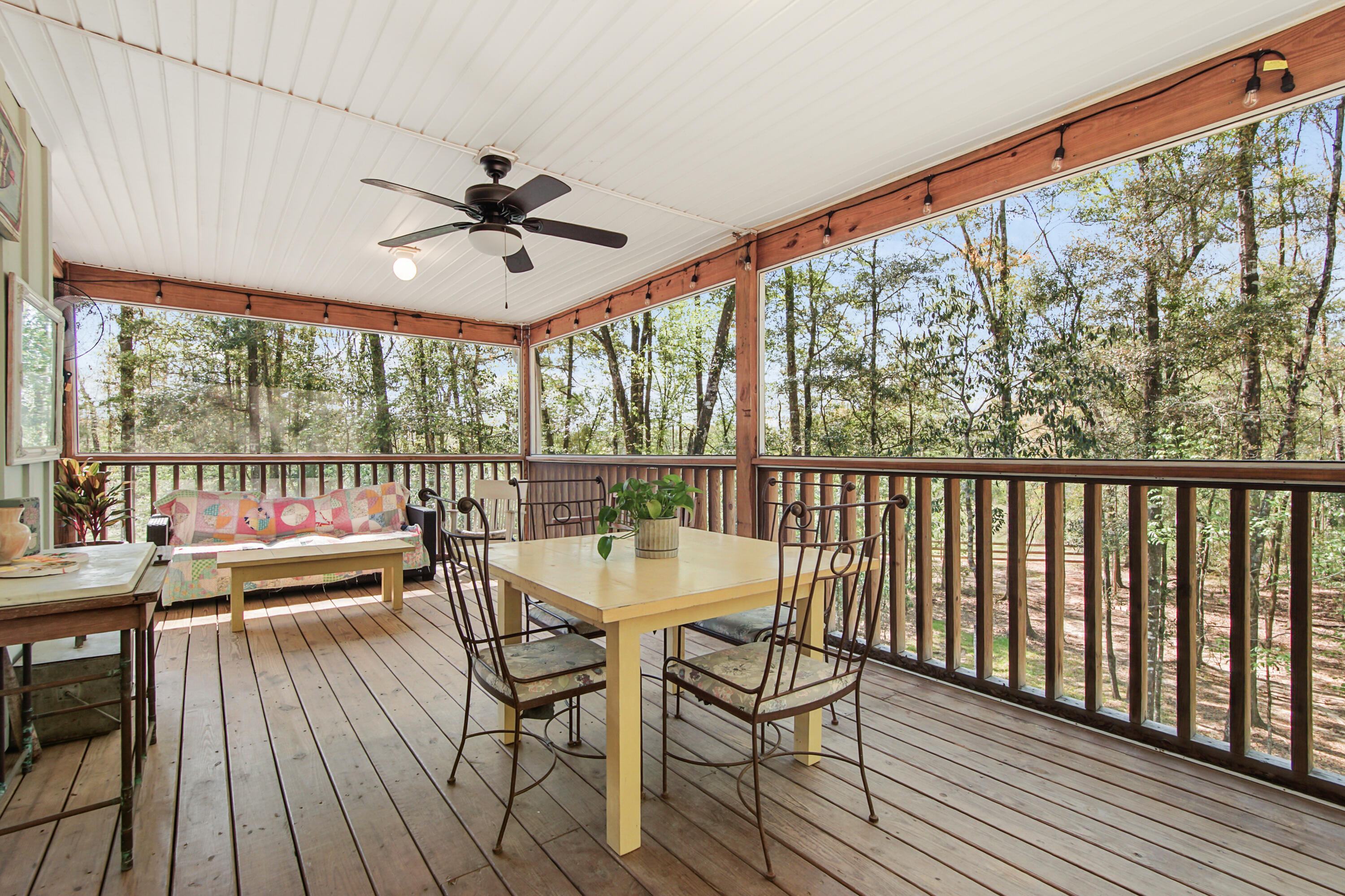 211 Lester Price Road Ponce de Leon, FL 32455 - Photo 2 of 63 a dining room with furniture window and wooden floor