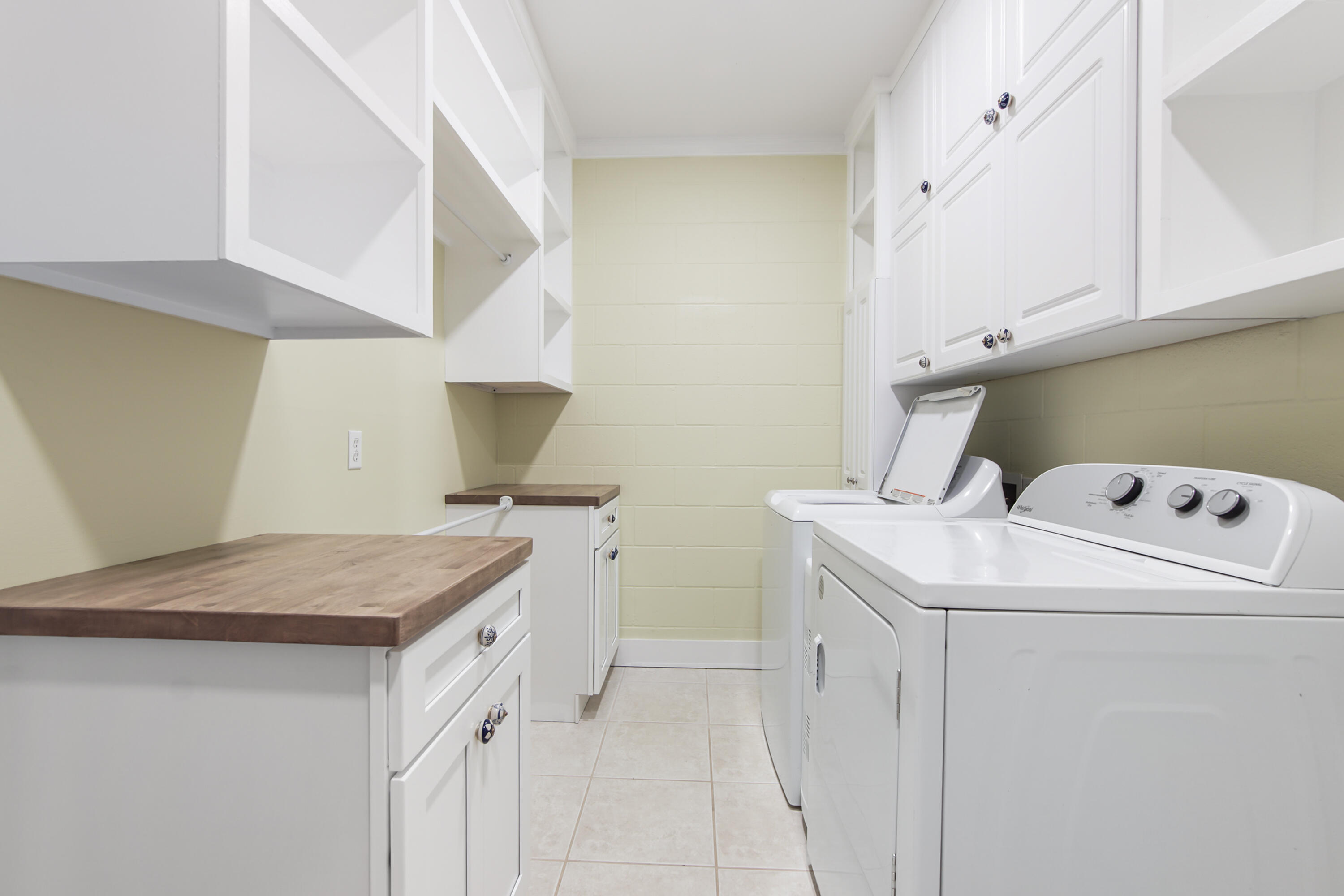 211 Lester Price Road Ponce de Leon, FL 32455 - Photo 25 of 63 a utility room with dryer and washer