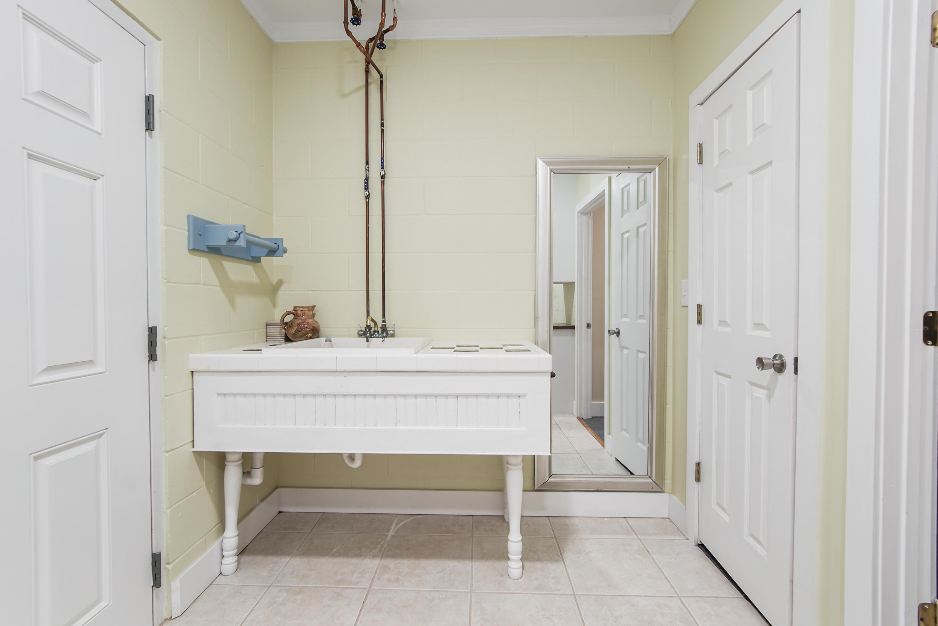211 Lester Price Road Ponce de Leon, FL 32455 - Photo 26 of 63 a bathroom with a sink and a mirror
