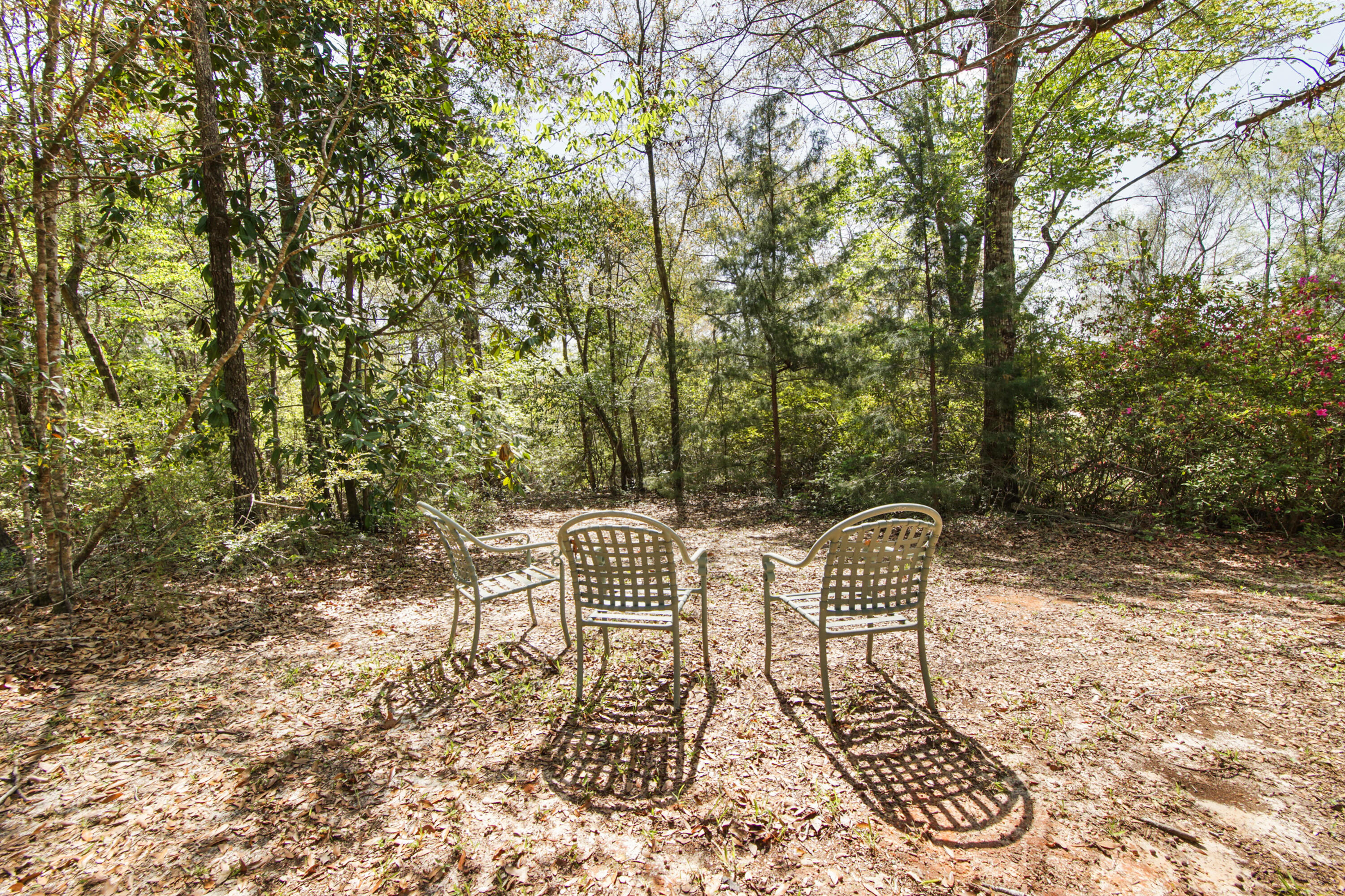 211 Lester Price Road Ponce de Leon, FL 32455 - Photo 38 of 63 a view of chair and table in the patio