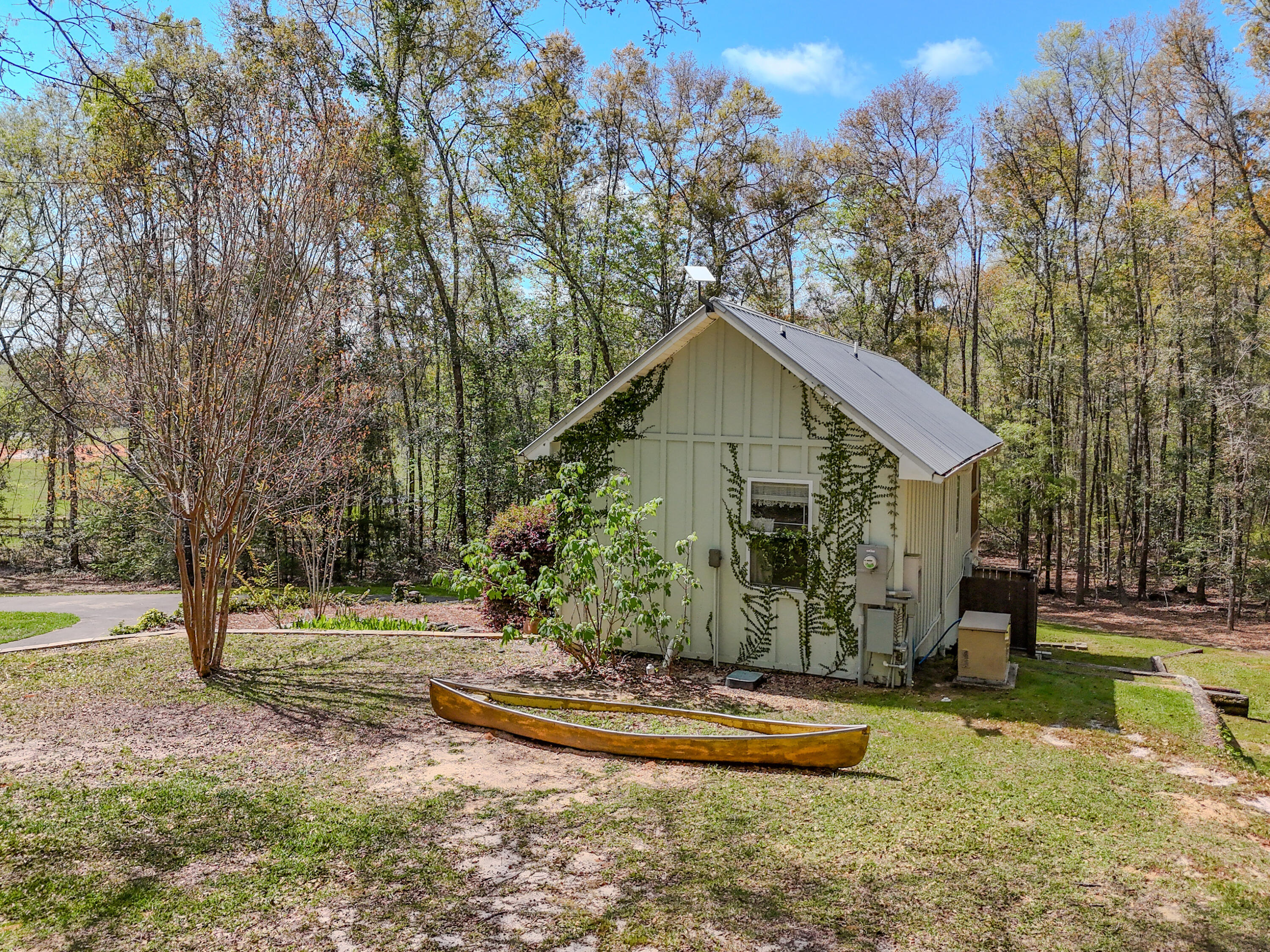 211 Lester Price Road Ponce de Leon, FL 32455 - Photo 61 of 63 a front view of a house with a yard