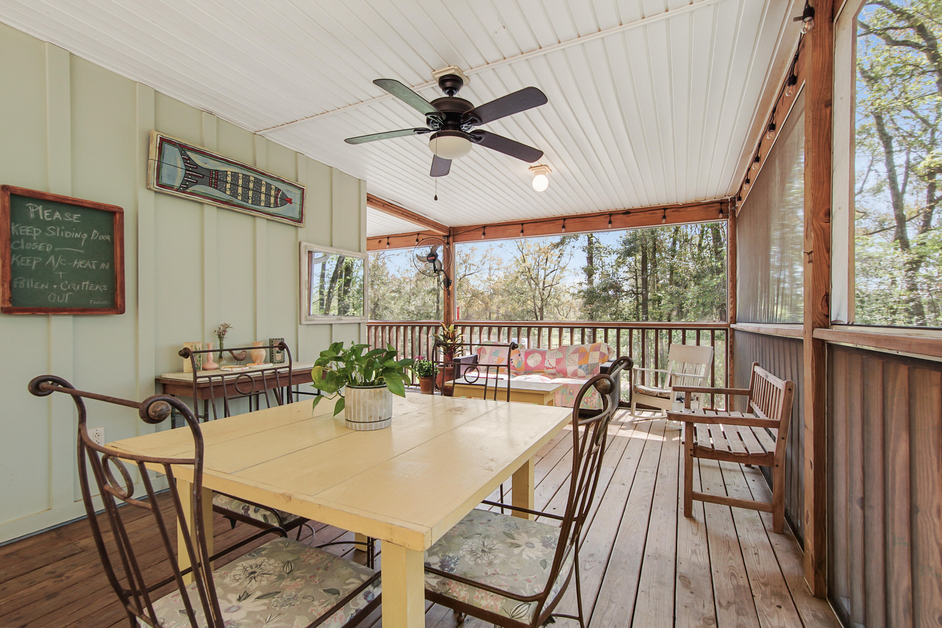 211 Lester Price Road Ponce de Leon, FL 32455 - Photo 10 of 63 a view of a dining room with furniture window and outside view