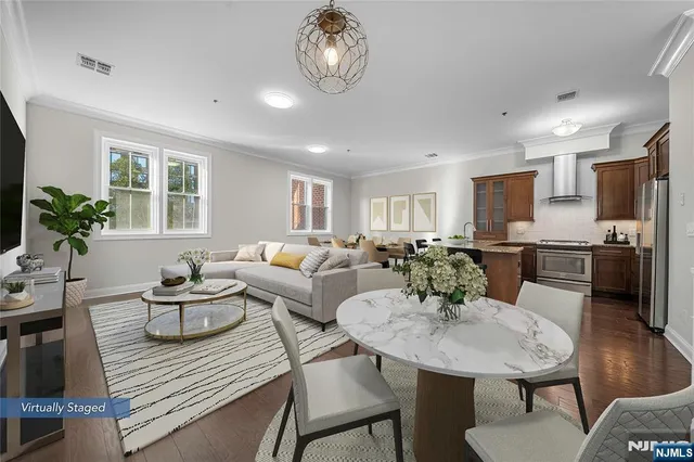 a view of a dining room with furniture