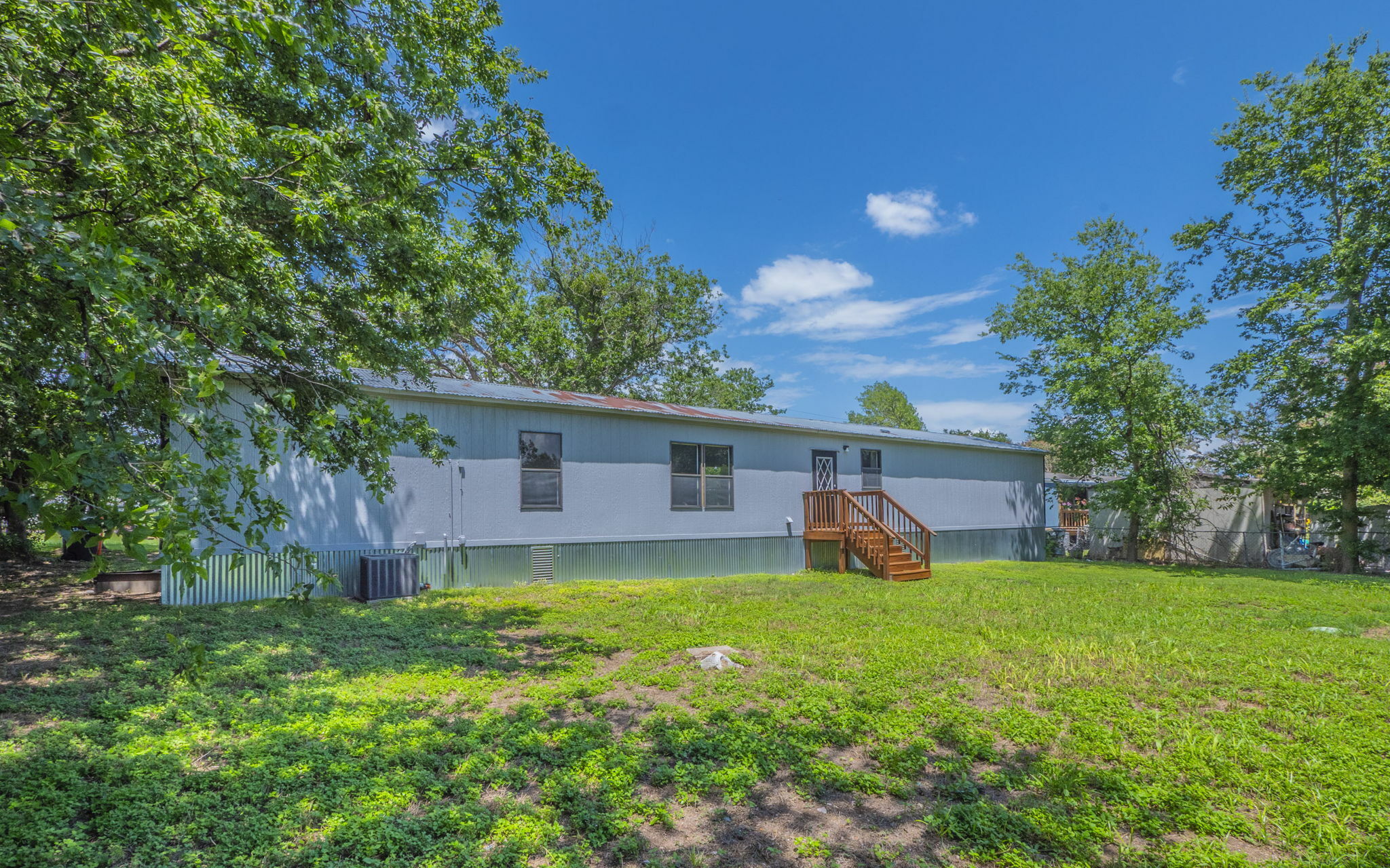 178 Quail Ridge Drive Kyle, TX 78640 - Photo 2 of 18 a view of a house with a yard and tree