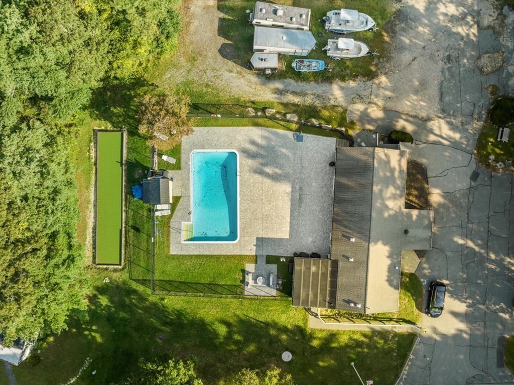 209 Windswept Road Wareham, MA 02571 - Photo 15 of 17 a building with trees in front of it