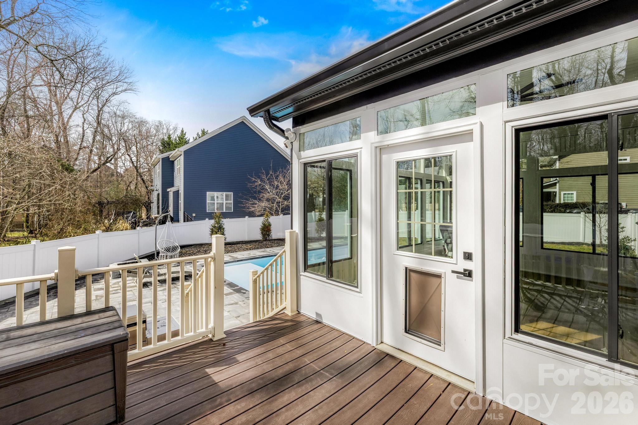 18441 Davidson-Concord Road Davidson, NC 28036 - Photo 15 of 36 a view of a chair and tables in the balcony