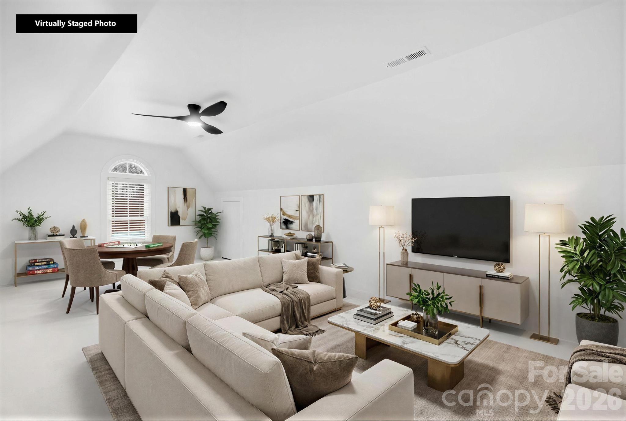 18441 Davidson-Concord Road Davidson, NC 28036 - Photo 28 of 36 a living room with furniture and a flat screen tv