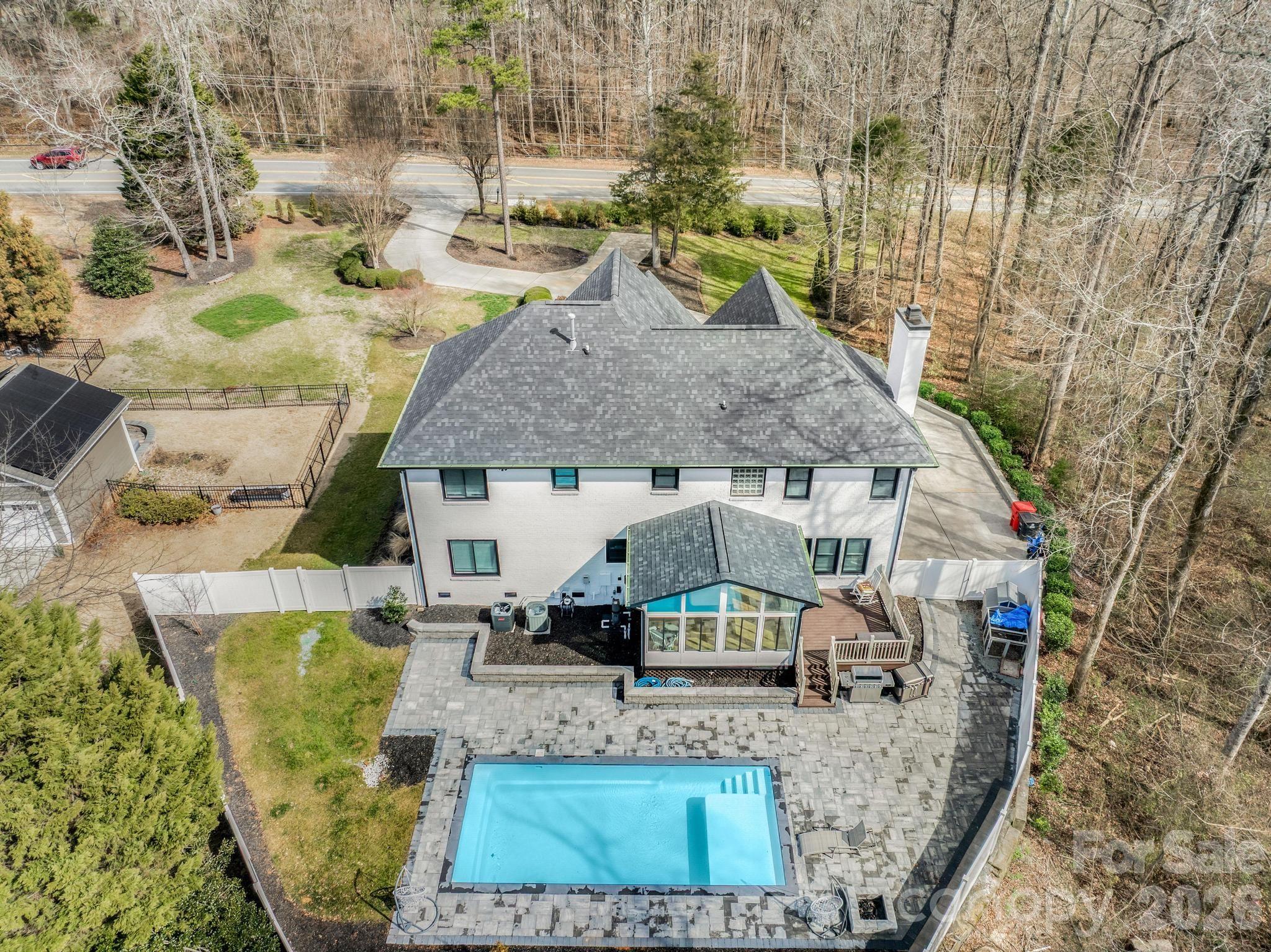 18441 Davidson-Concord Road Davidson, NC 28036 - Photo 31 of 36 an aerial view of a house with large trees