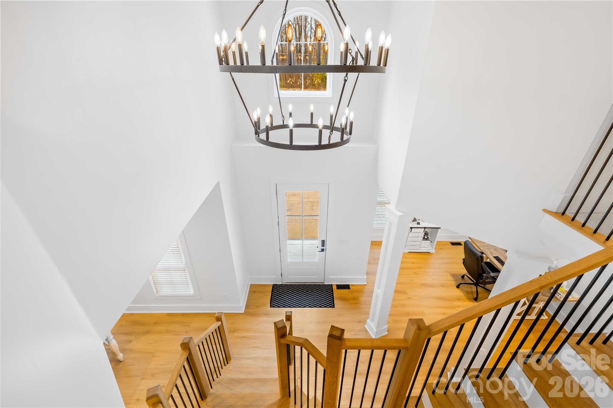18441 Davidson-Concord Road Davidson, NC 28036 - Photo 5 of 36 a view of living room with a bed furniture and mirror