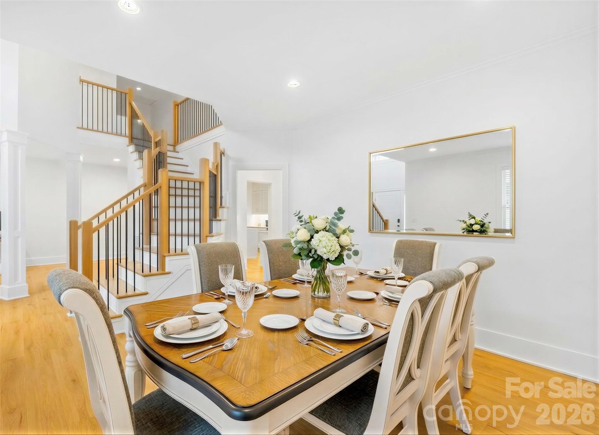 18441 Davidson-Concord Road Davidson, NC 28036 - Photo 6 of 36 a dining room with furniture and wooden floor