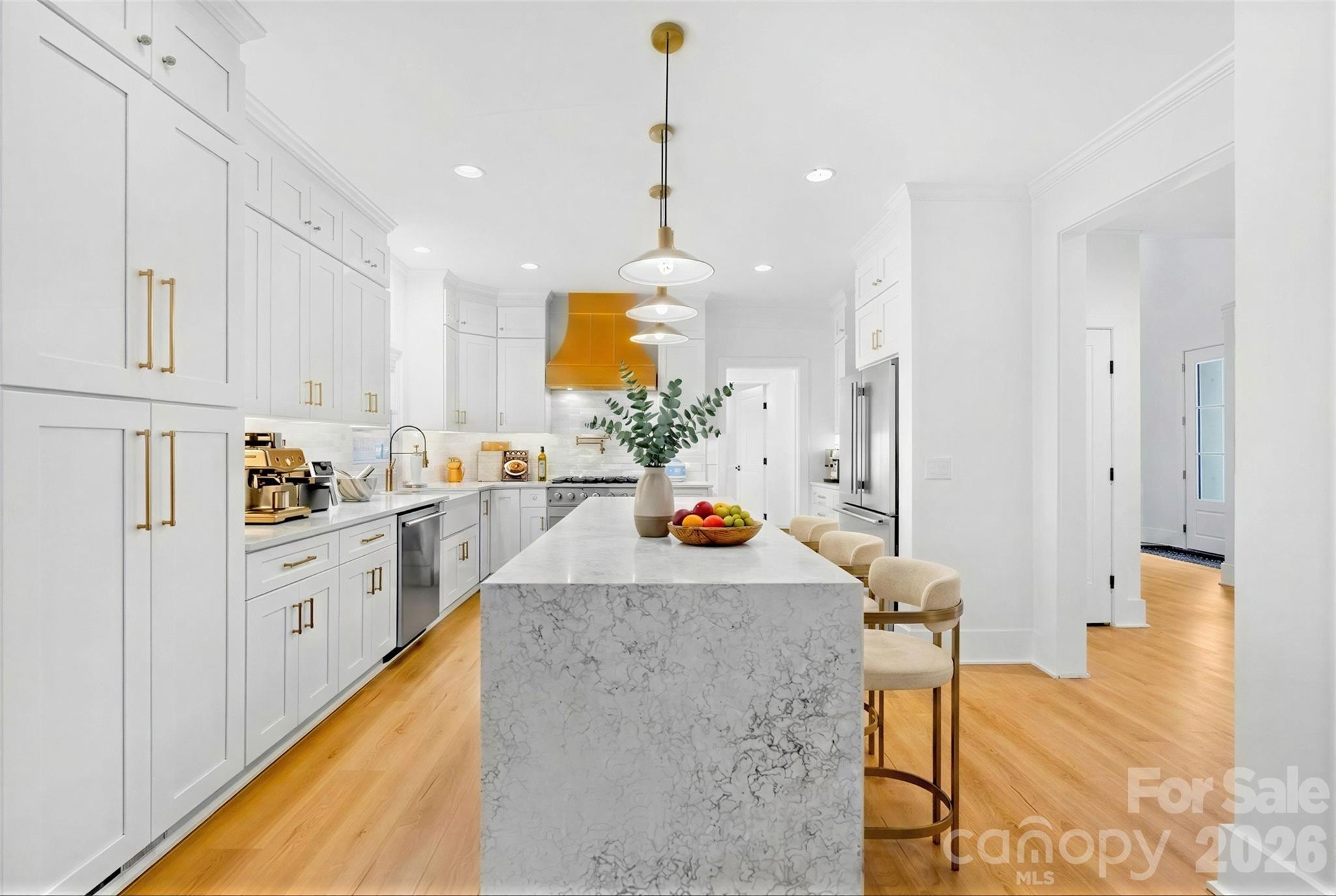 18441 Davidson-Concord Road Davidson, NC 28036 - Photo 8 of 36 a kitchen with stainless steel appliances granite countertop a stove and white cabinets